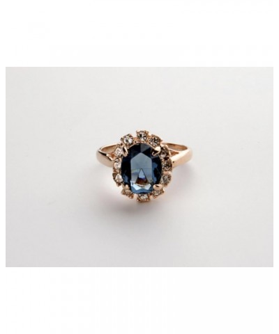 Rose Gold Plated Oval Shaped Gem Style Ring with Sapphire Blue Swarovski element Crystal and Clear Round Shaped Cubic Zirconi...