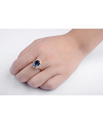 Rose Gold Plated Oval Shaped Gem Style Ring with Sapphire Blue Swarovski element Crystal and Clear Round Shaped Cubic Zirconi...